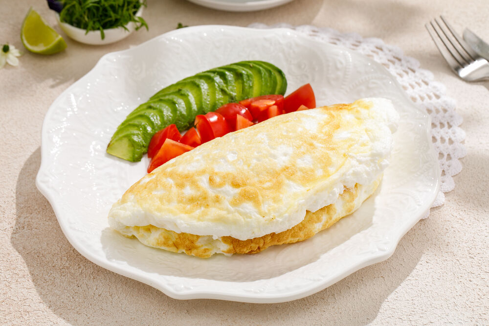 White omelette with avocado and tomatoes