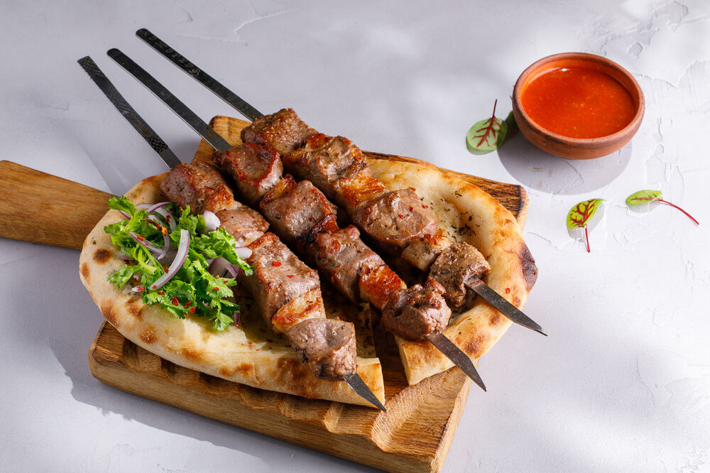 Grilled beef sirloin shashlik with fat tail