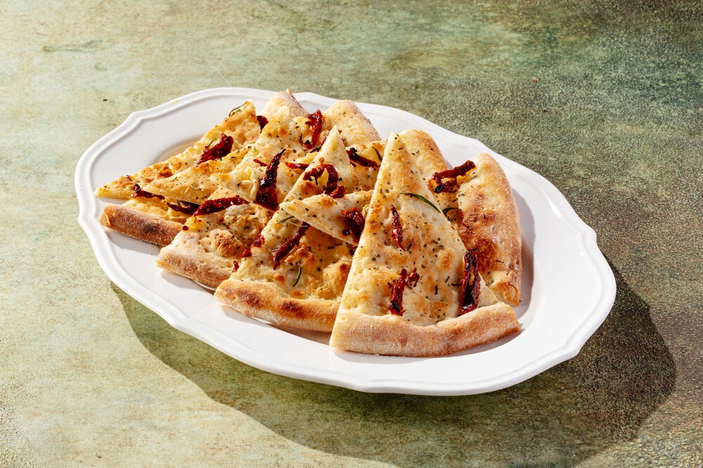 Focaccia with dried tomatoes and rosemary