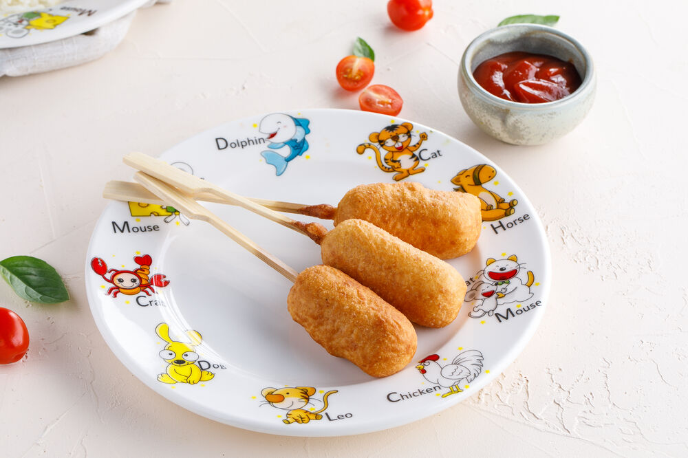 Sausages in dough with ketchup for kids