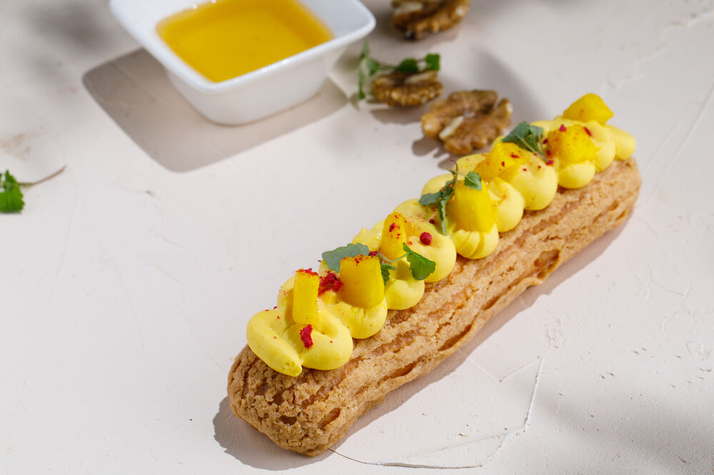Eclair with passion fruit
