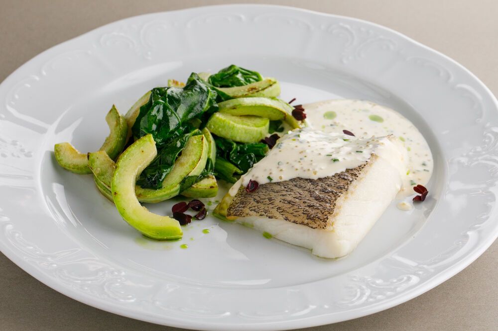 Halibut with zucchini and spinach sauté
