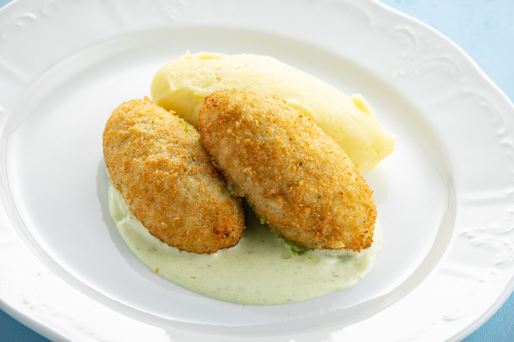 Cod cutlets with spinach sauce