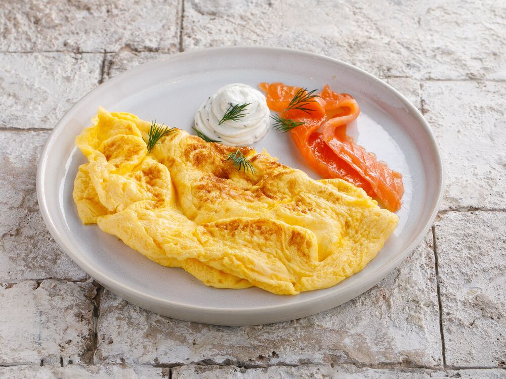 Omelet with salmon and cream cheese sauce