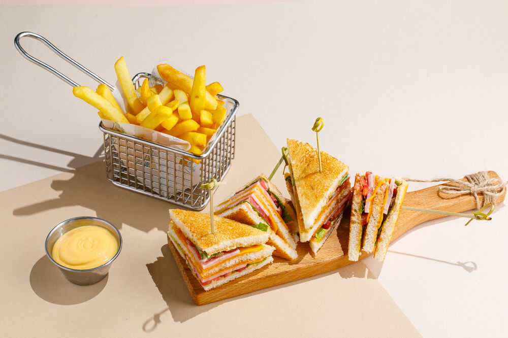 Club sandwich with French fries
