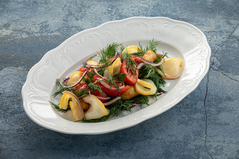 Salad with halibut and tomatoes