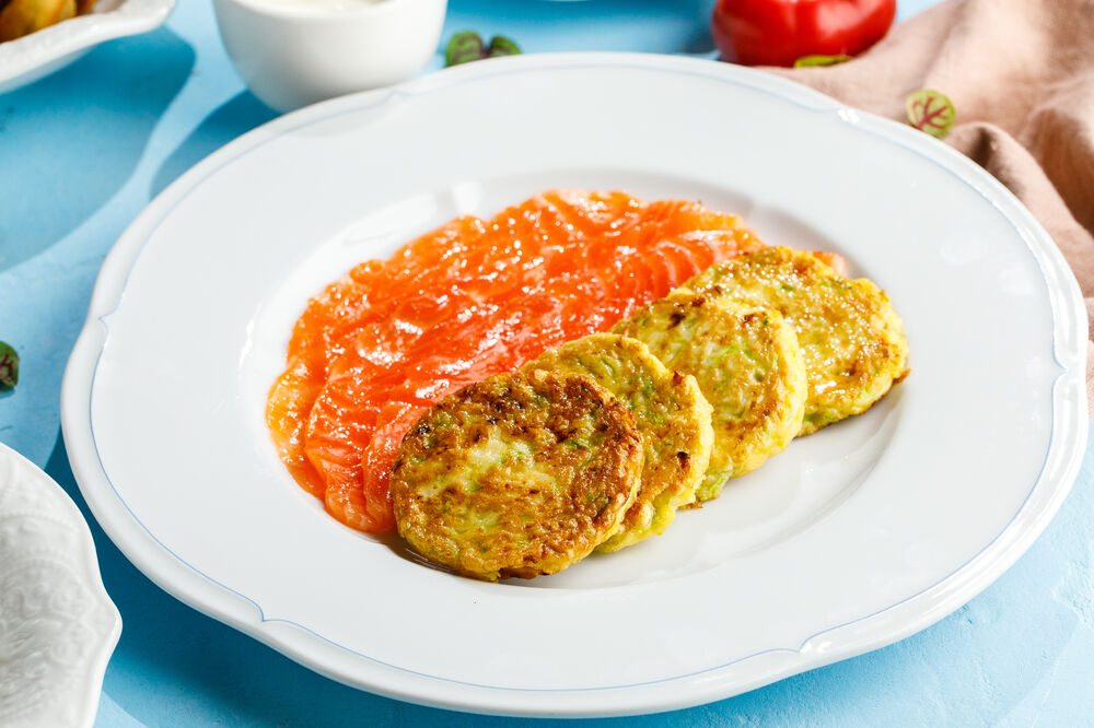 Zucchini pancakes with trout