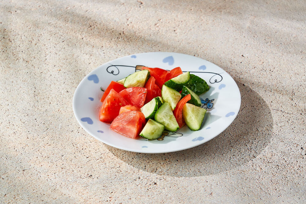 Cucumbers and tomatoes with butter