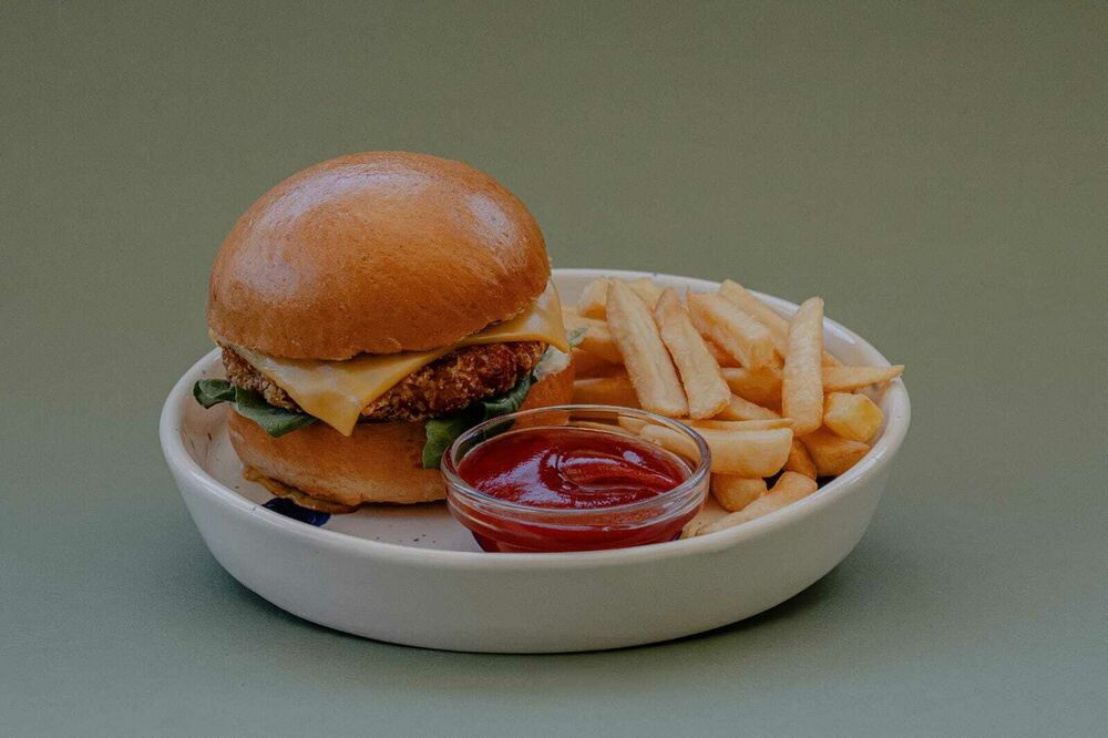 Cheeseburger with beef and French fries