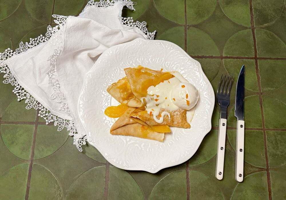 Pancakes with orange and vanilla ice cream