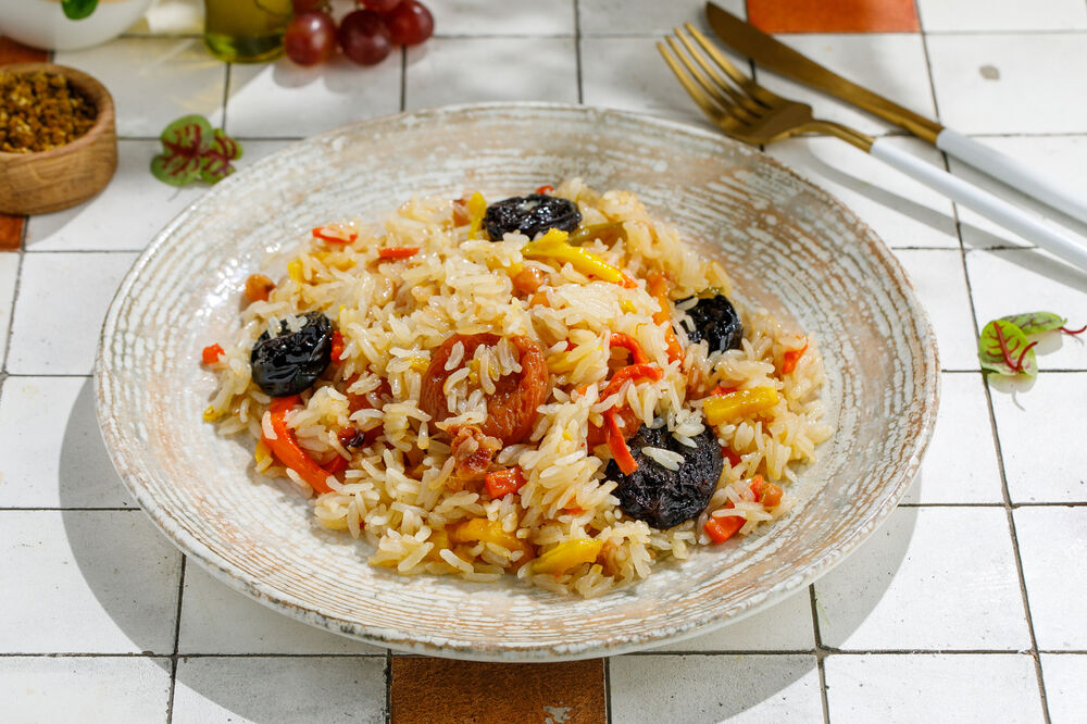 Pilaf with prunes and dried apricots