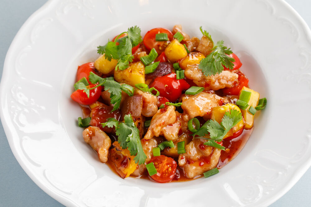Wok chicken with vegetables and pineapple