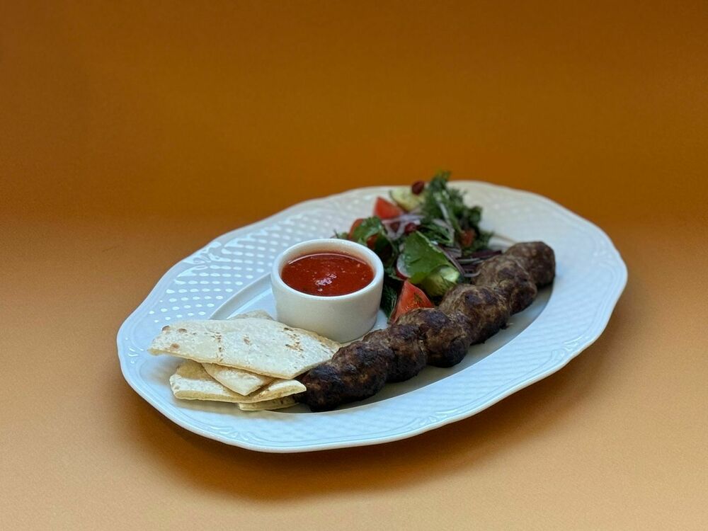 Beef kebab with tzatziki sauce