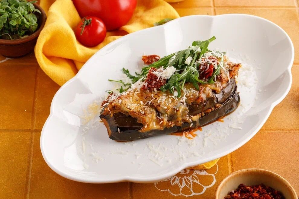 Layered eggplant with meat and smoked cheese