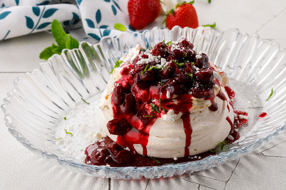 Dessert "Pavlova" with cherries
