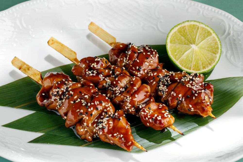 Chicken skewers in unagi-teriyaki sauce