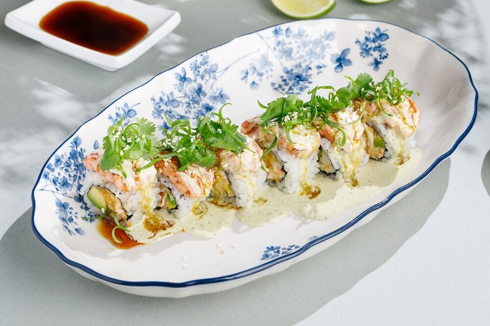 Roll with salmon, orange and jalapeno