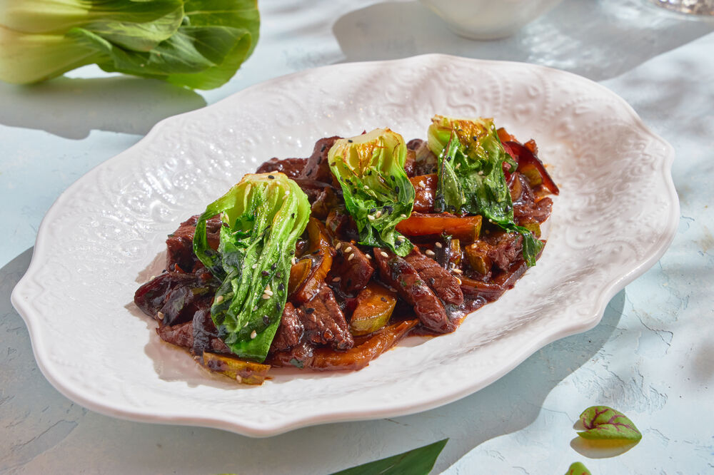Beef with vegetables and pak choi