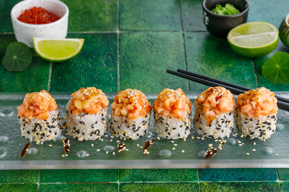 Baked roll with seafood in sesame seeds