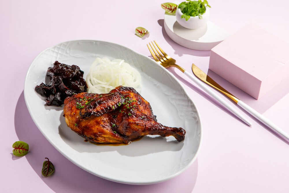 Baked chicken with dried beets in tkemali sauce