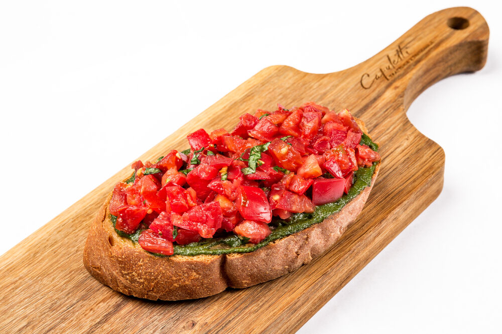 Bruschetta with tomatoes and pesto sauce