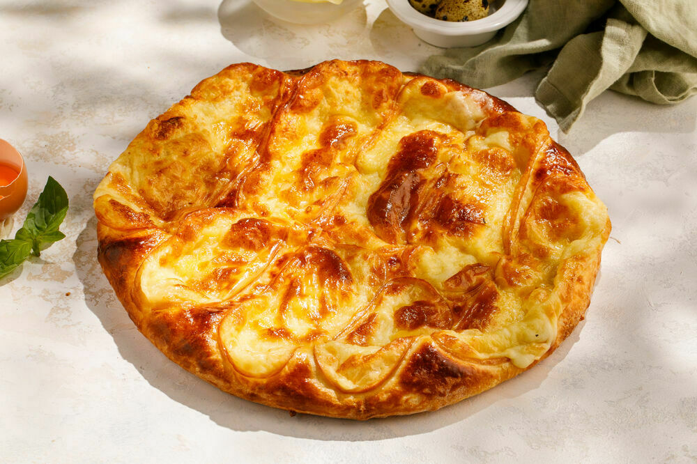 Khachapuri with smoked suluguni cheese