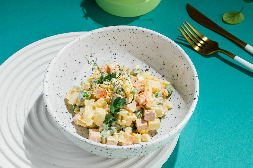 Olivier salad with sausage