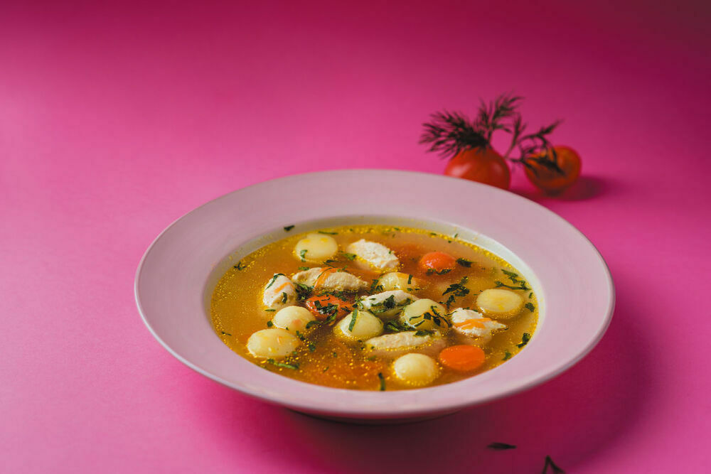 Soup with quenelles of Turkey for children