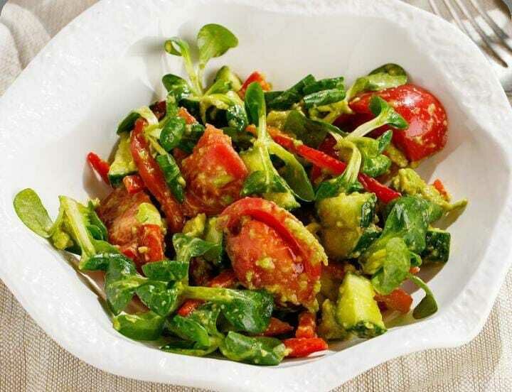 Salad with ripe tomatoes and avocado