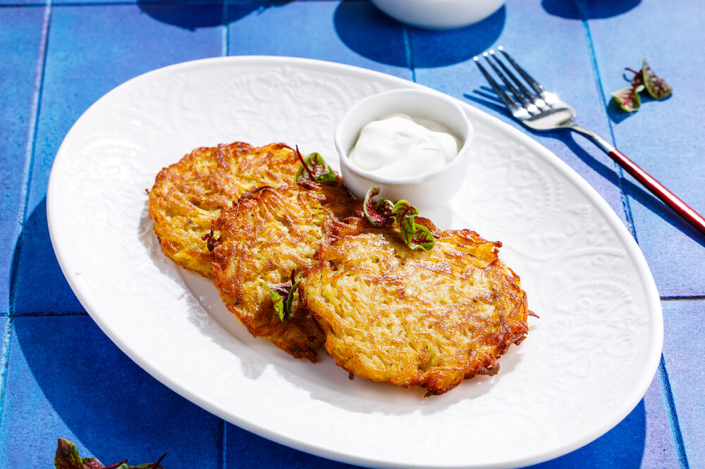 Potato pancakes with sour cream