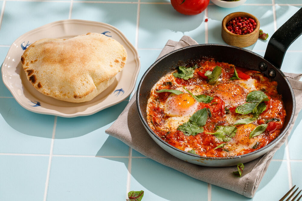 Shakshuka with baked peppers and tomatoes