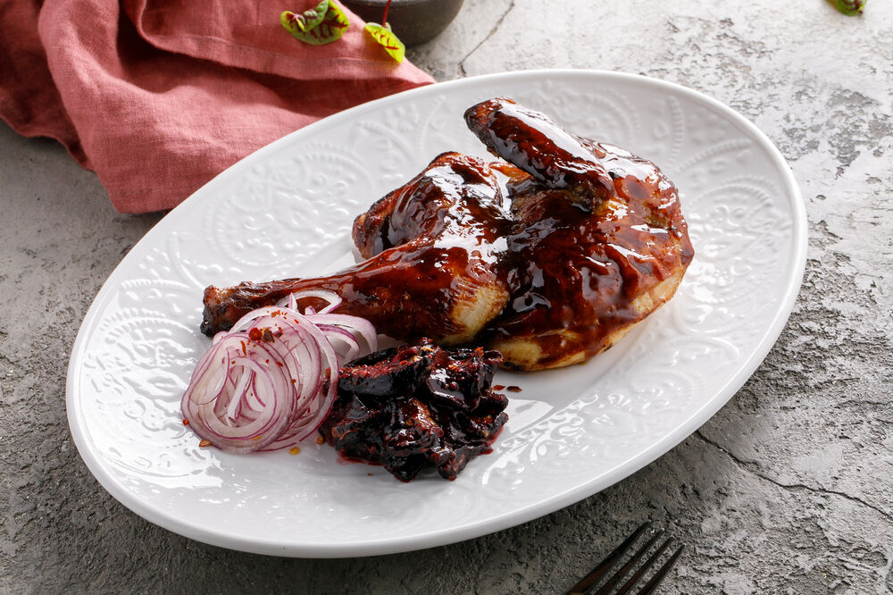 Baked branded chicken with dried beetroot in tkemali sauce