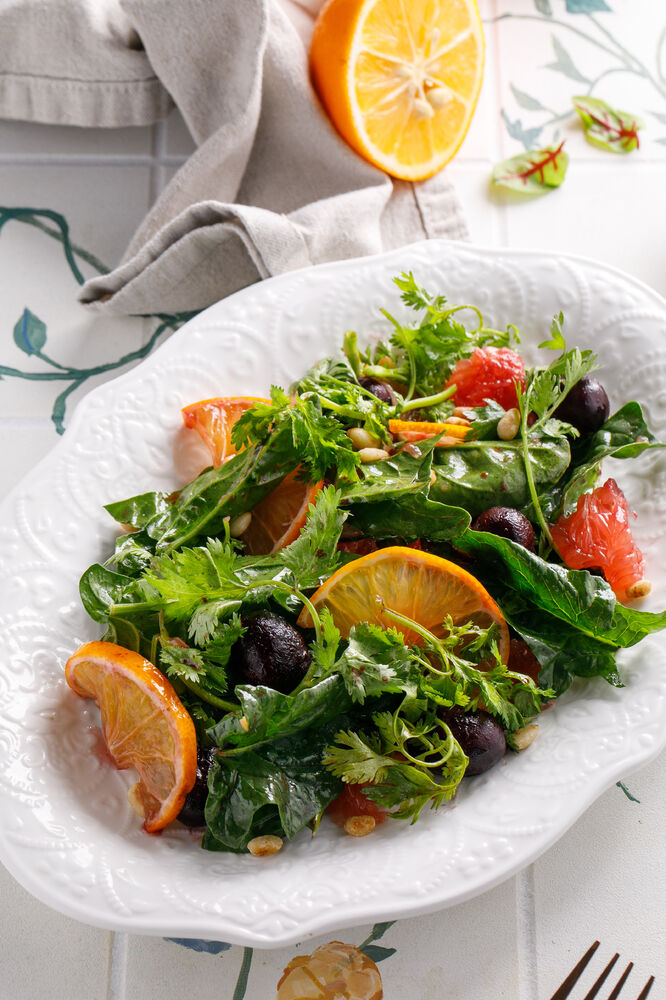 Citrus salad with roasted grapes and pine nuts