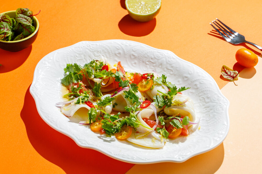 Salad with squid and kumquat