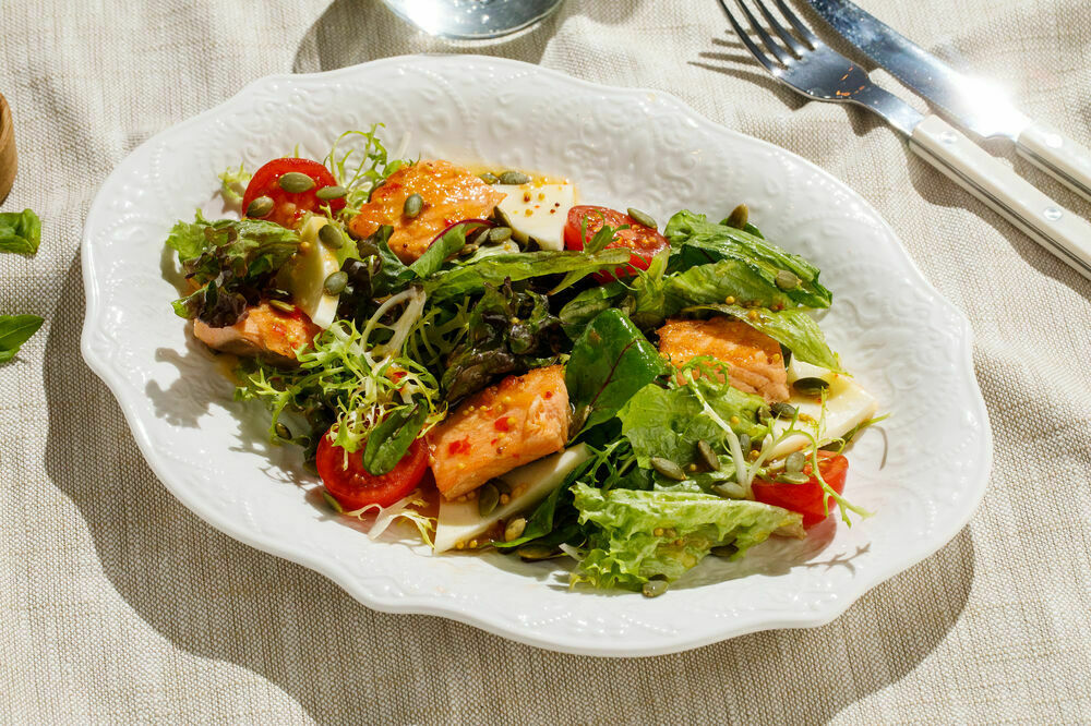 Warm salad with trout and suluguni cheese