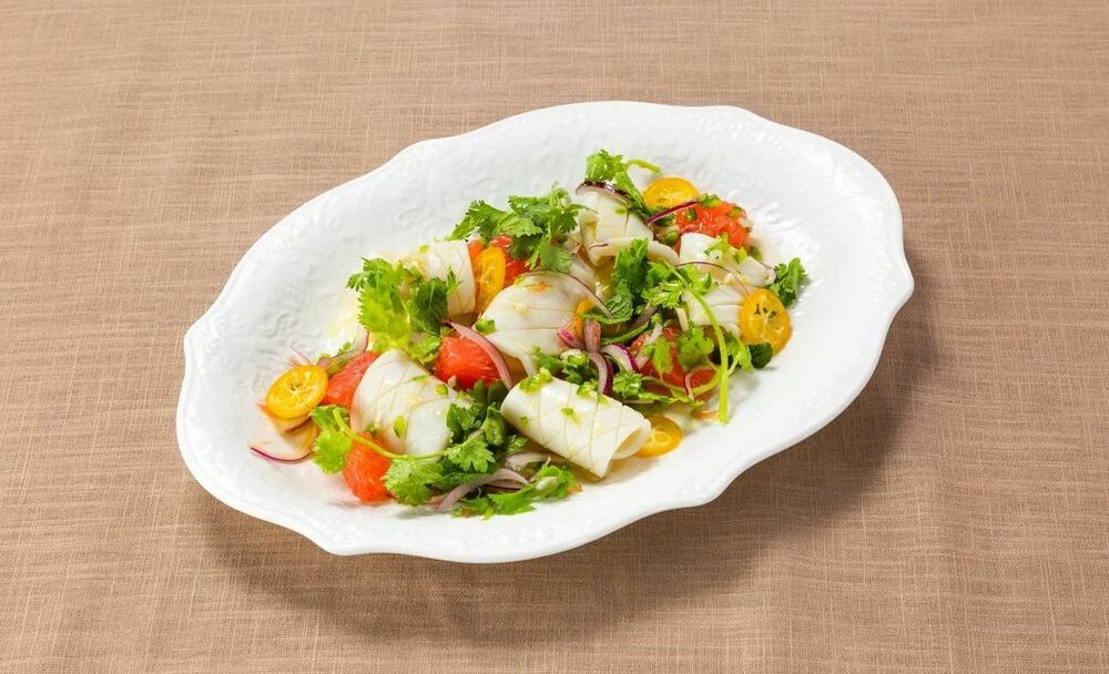 Salad with squid and kumquat