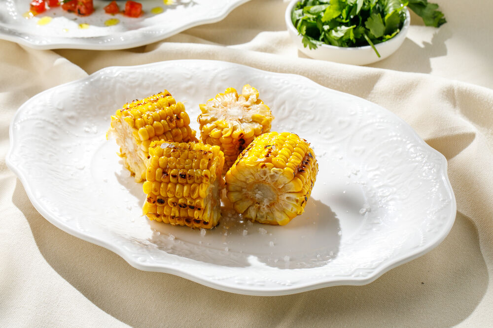 Cob of corn on coals