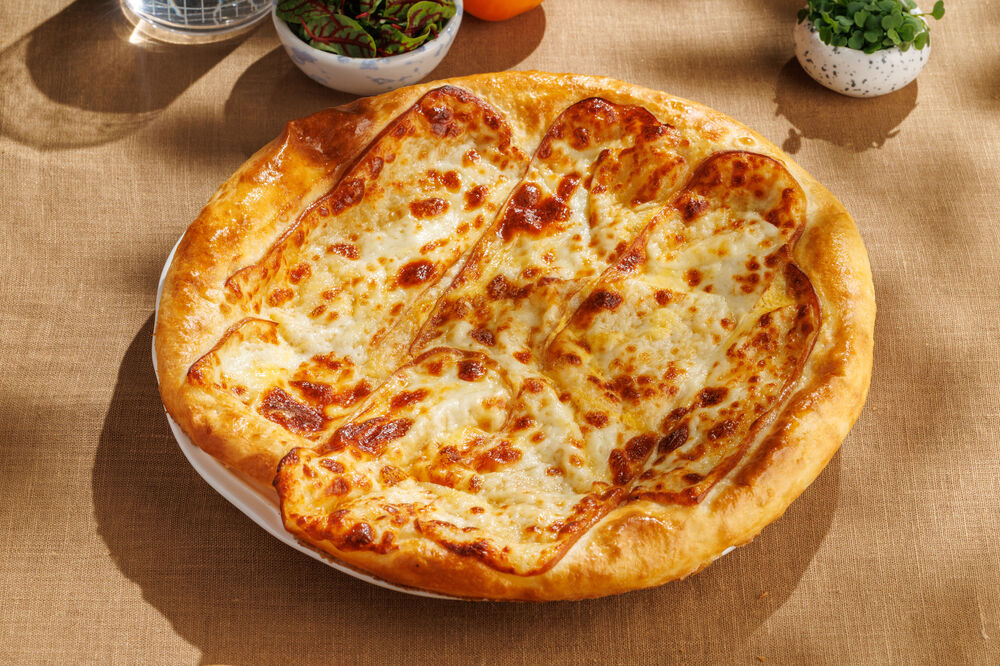 Khachapuri with smoked suluguni cheese