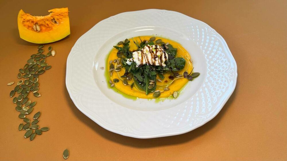 Pumpkin carpaccio with strachatella and seeds