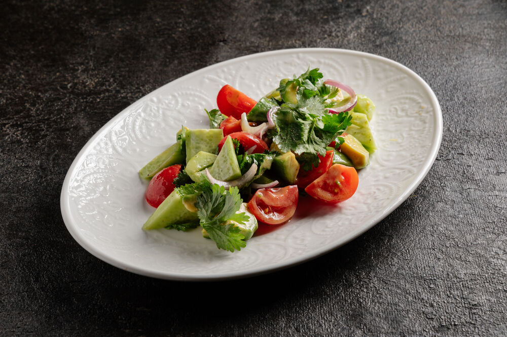 Italian salad with avocado and Baku tomatoes