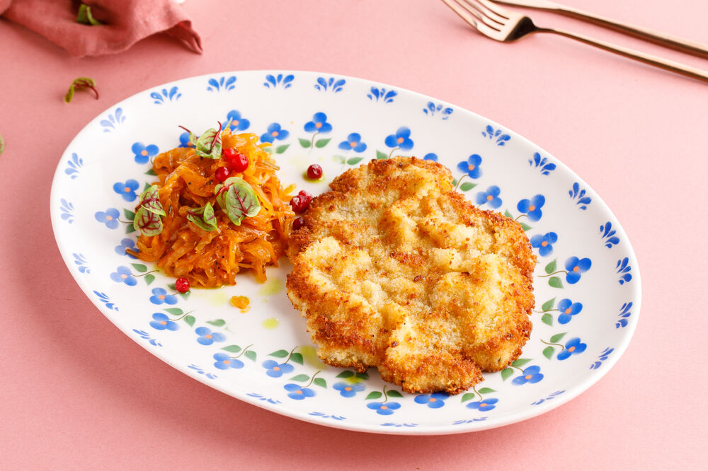 Рork schnitzel with stewed sauerkraut