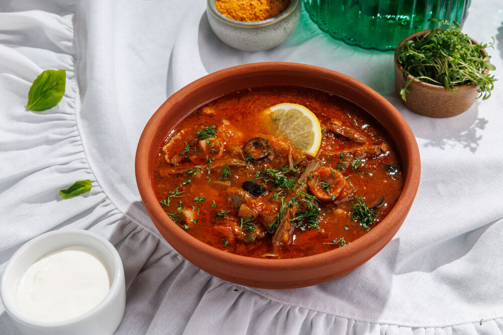 Solyanka with homemade smoked meats