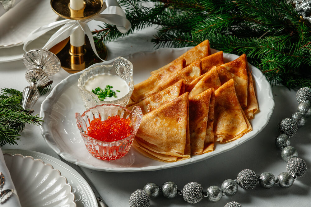 Pancakes with red caviar 