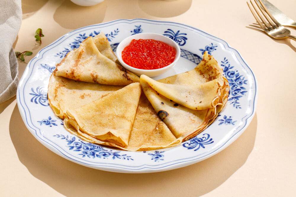 Crepes with red caviar