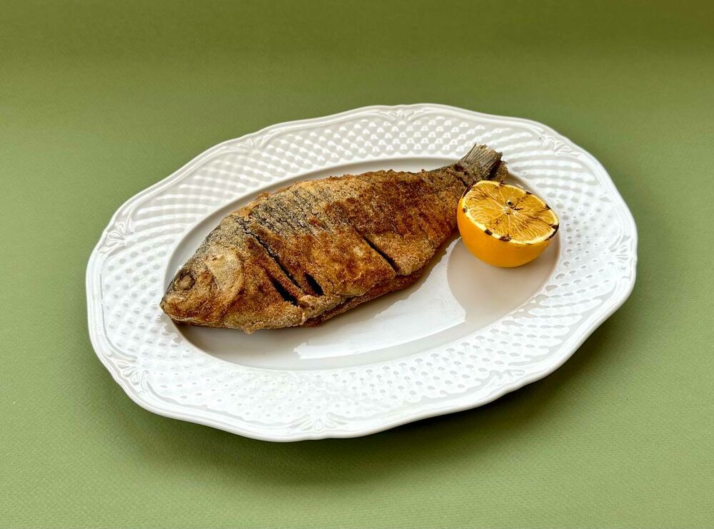 Fried crucian carp with a crispy crust