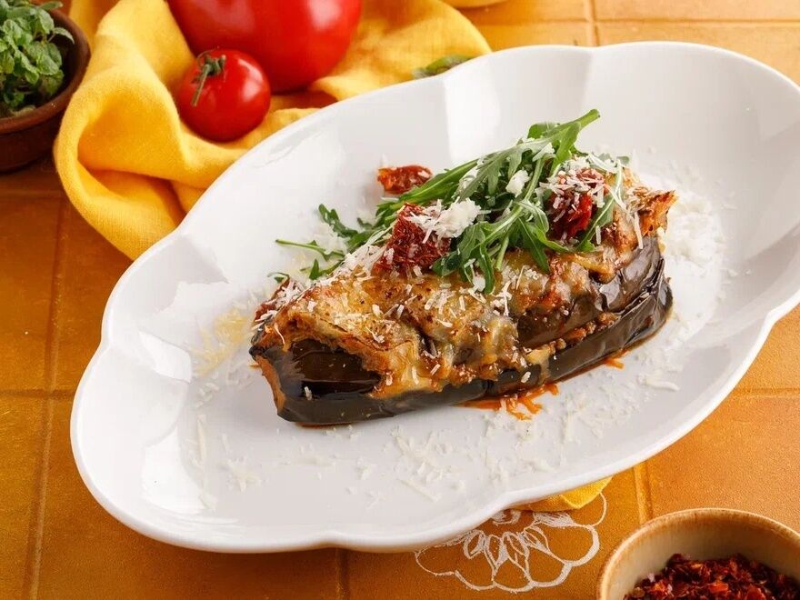 Layered eggplant with meat and smoked cheese