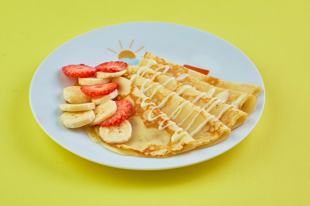 Pancakes with banana and condensed milk