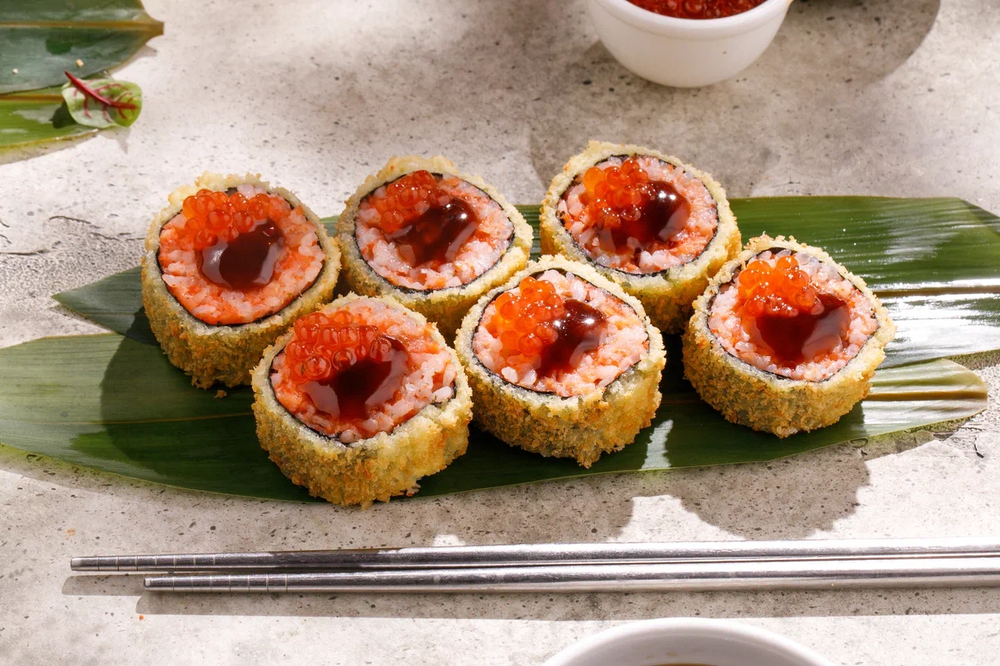 Roll with smoked salmon and red caviar