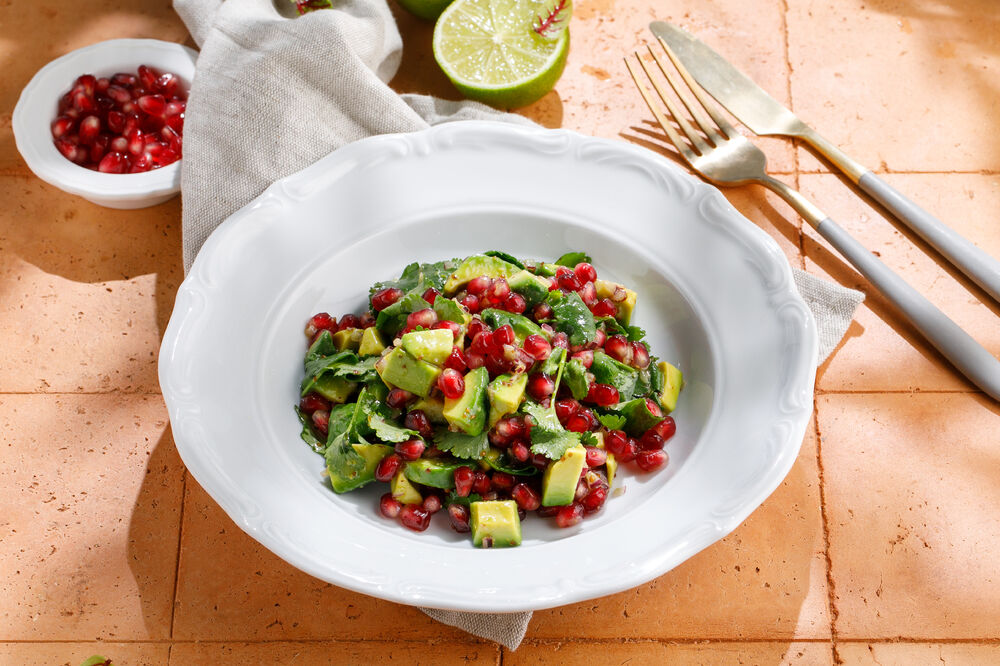 Light salad with avocado and pomegranate