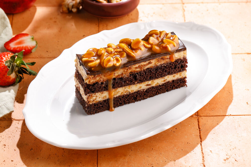 Chocolate cake with peanuts and caramel